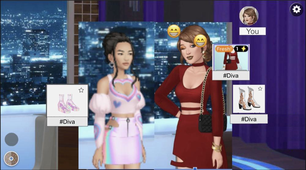 PR Showdown prototype: two styled avatars side by side with #Diva theme item cards and emoji reactions